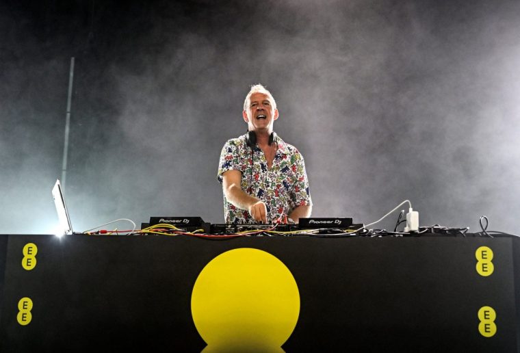 LONDON, ENGLAND - OCTOBER 19: Fatboy Slim and virtual backing dancers from across the UK light up the sky above Alexandra Palace, to form the world's biggest holographic performance for the launch of the new EE, on October 19, 2023 in London, England. (Photo by Samir Hussein/Getty Images for EE)