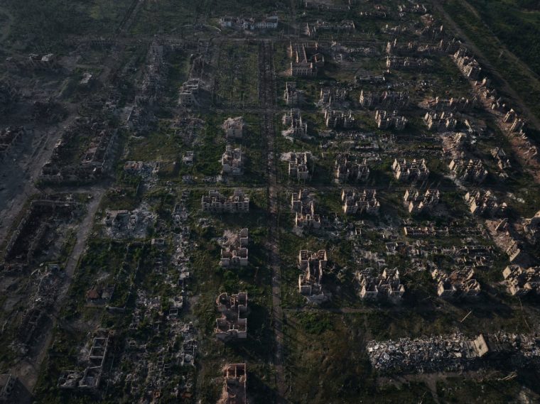 CHASIV YAR, UKRAINE - JULY 24: In this aerial view, the ruins of destroyed buildings are seen in the city of Chasiv Yar at dawn on July 24, 2025 in Chasiv Yar, Donetsk Oblast, Ukraine. Russia has waged a long-running campaign on Chasiv Yar, a fortified eastern city whose capture could allow Russia to advance deeper into the Donetsk region. (Photo by Kostiantyn Liberov/Libkos/Getty Images)