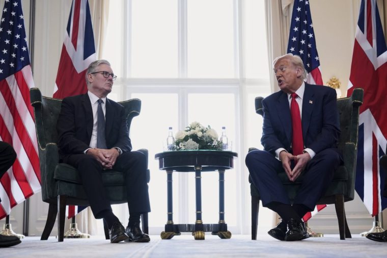 President Donald Trump, right, meets with Britain's Prime Minister Keir Starmer at the Trump Turnberry golf course in Turnberry, Scotland Monday, July 28, 2025. (AP Photo/Jacquelyn Martin)