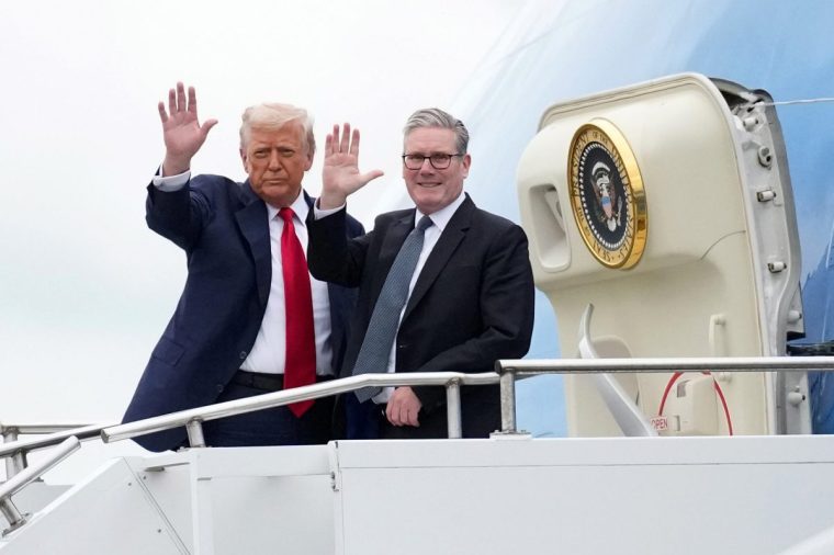 PRESTWICK, UNITED KINGDOM - JULY 28: U.S. President Donald Trump and British Prime Minister Keir Starmer wave as they board Air Force One at Prestwick Airport ahead of a flight to north-east Scotland on July 28, 2025 in Prestwick, Scotland. The pair are meeting at Turnberry before traveling together to Aberdeenshire to have a private dinner at another Trump-owned golf club. President Trump is visiting Scotland in a trip that???s part-vacation, part-work, as he stays at his Trump Turnberry golf course, followed by the Trump International Golf Links in Aberdeenshire, between July 25 to 29. (Photo by Andrew Harnik/Getty Images) *** BESTPIX ***
