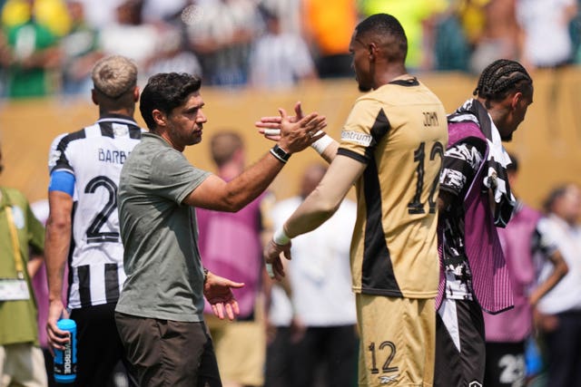 Palmeiras coach Abel Ferreira (left) shakes hands with the Botafogo goalkeeper following their Club World Cup round of 16 match