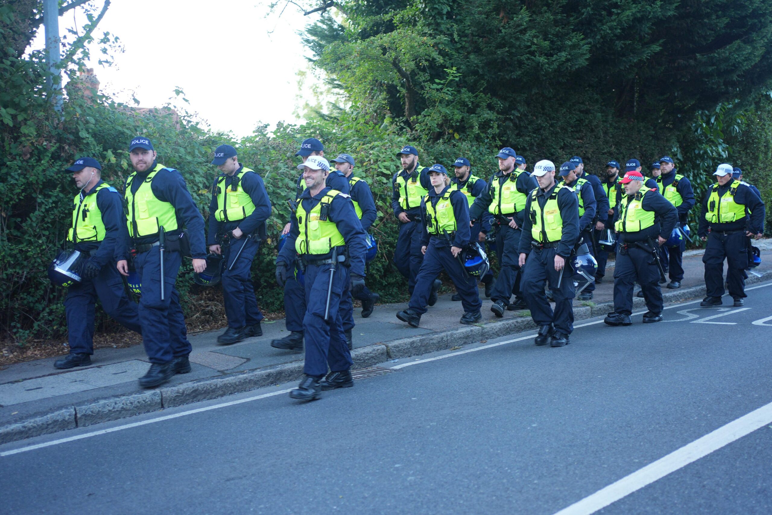 Police near the Bell Hotel in Epping, Essex, during a protest (Yui Mok/PA)