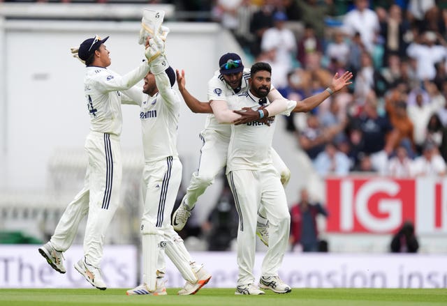Mohammed Siraj, right, and India celebrate after taking the match-winning wicket of England’s Gus Atkinson, not pictured