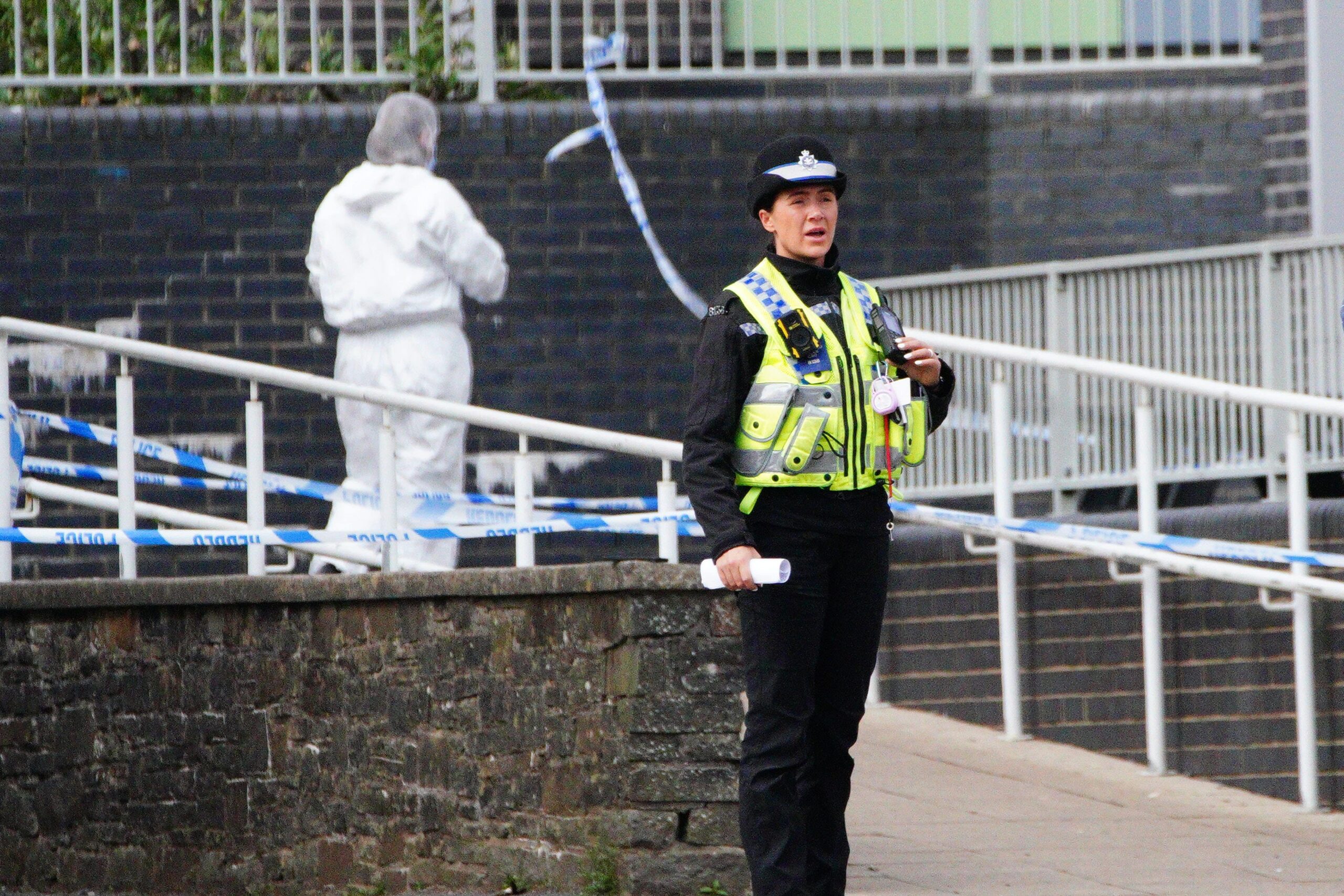 Police and forensic investigators at Ysgol Dyffryn Aman following the incident