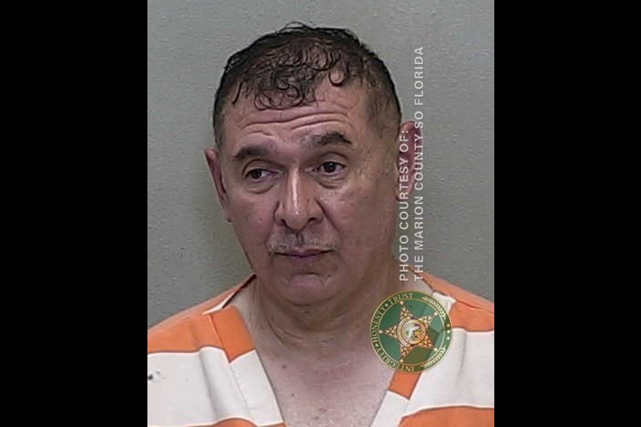 Antonio Roman was arrested after police say he intentionally set off sprinklers aimed at his disabled neighbors as they got on and off their bus in Ocala, Florida.