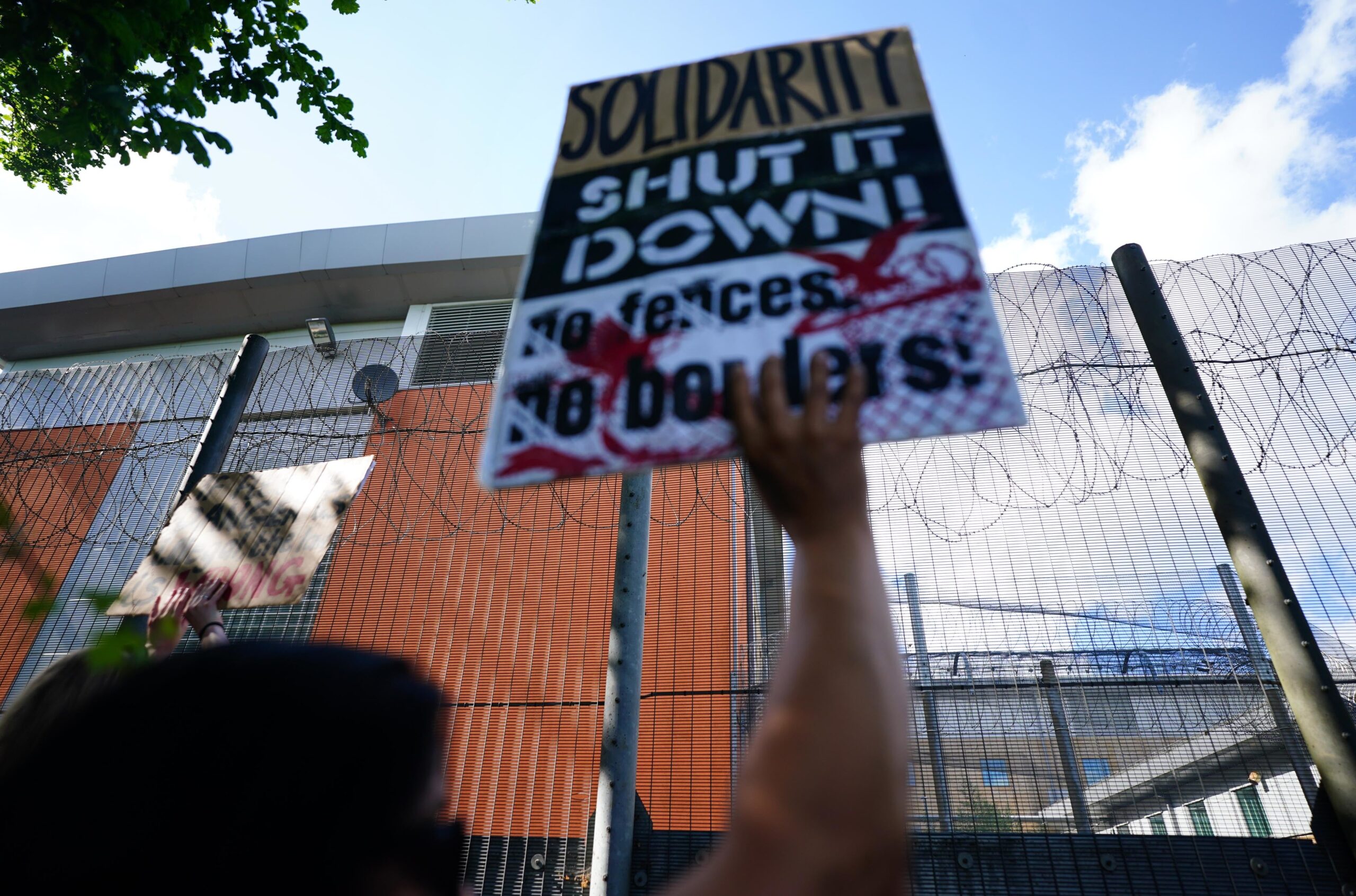 Migrants rights groups hold a show of support for people detained at Brook House Immigration Removal Centre at Gatwick who were scheduled to be sent to Rwanda in 2022.