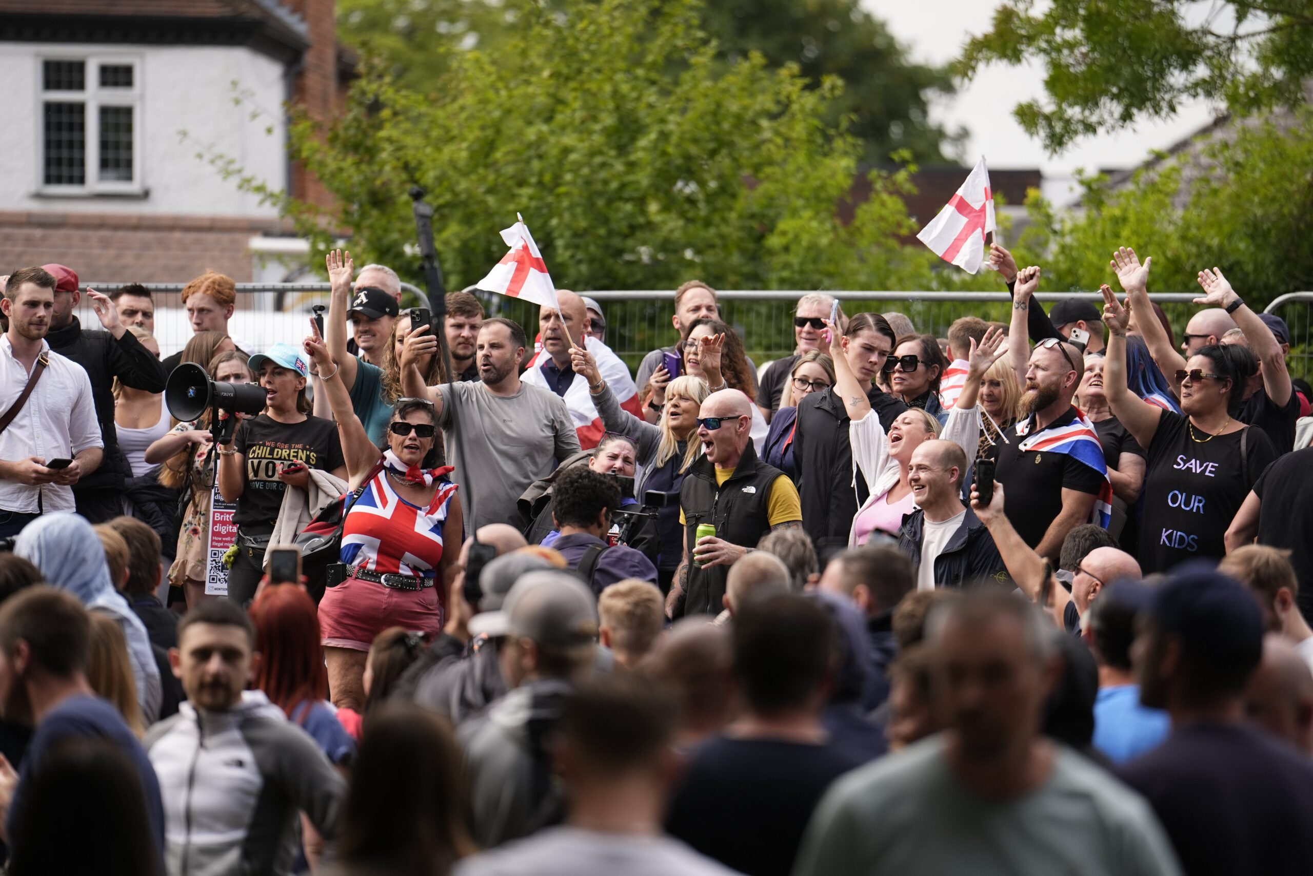 Protesters outside the former Bell Hotel in Epping, where there have been a number of demonstrations, after police charged 38-year-old asylum seeker Hadush Gerberslasie Kebatu with sexual assault following an incident where he is alleged to have attempted to kiss a 14-year-old girl