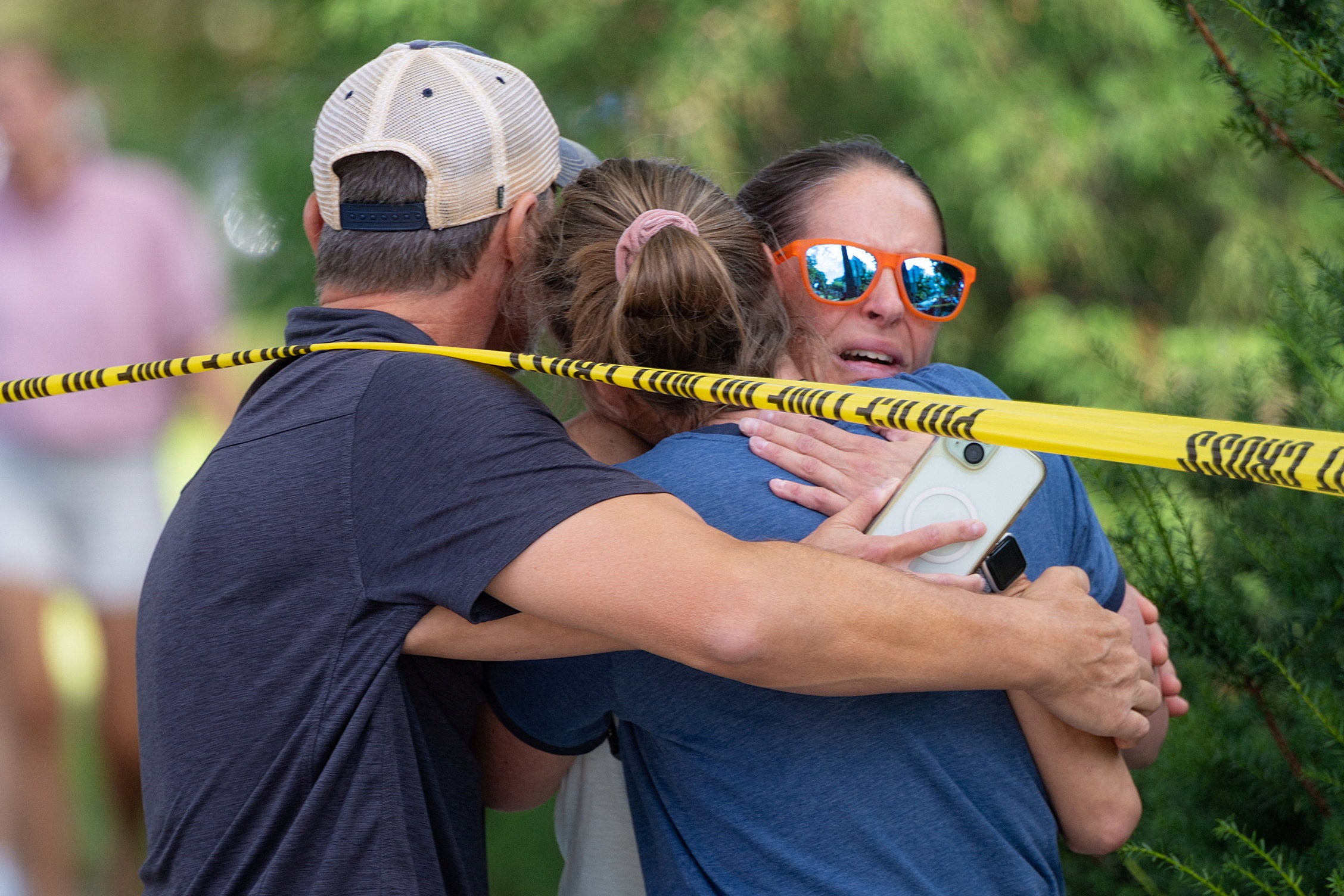 Two children died and 17 others have been injured after a suspect fired ‘dozens’ of rounds at a church in Minneapolis.