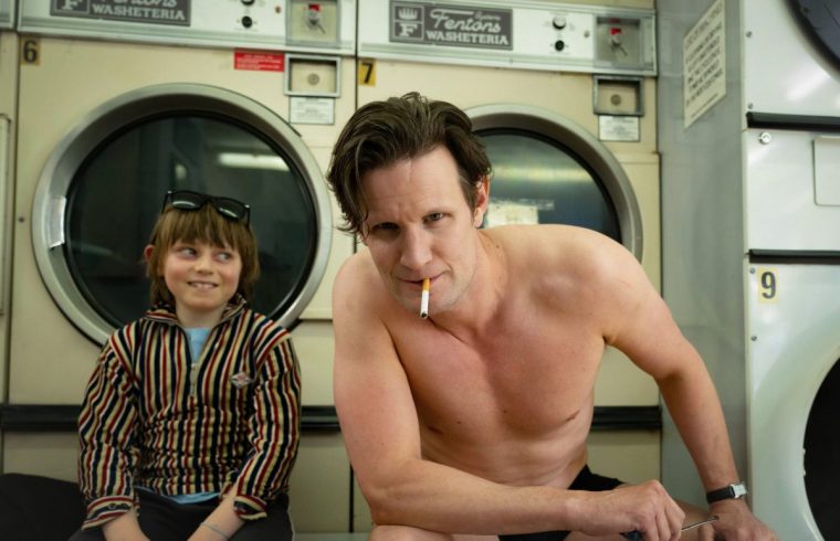 Sky unveils a first-look image from the upcoming six-part limited series ???The Death of Bunny Munro???, starring BAFTA and Emmy-nominated actor Matt Smith in the titular role. Pictured alongside Smith in the first look revealed today is newcomer Rafael Math??, who plays Bunny Junior. The six-part series, written by BAFTA winner Pete Jackson (Somewhere Boy) and directed by BAFTA-nominated Isabella Ekl??f (Industry, Holiday), is based on Nick Cave???s sophomore novel and produced by Clerkenwell Films in association with Sky Studios. Multi-talented and acclaimed musician and writer Nick Cave also serves as Executive Producer. Synopsis Following his wife Libby???s suicide, sex addict, door-to-door beauty product salesman and self-professed lothario Bunny Munro finds himself saddled with a young son and only a loose concept of parenting. Together with nine-year-old Bunny Junior he embarks on an epic and increasingly out-of-control road trip across Southern England as the two struggle to contain their grief in very different ways. As Bunny bounces from one sales pitch to the next, trying to seduce any woman he meets, Bunny Junior kills time talking to the ghost of his mother and distracting himself from the dawning realisation that his dad isn???t just fallible, he???s a fucking mess. As he starts to unravel, Bunny realises he must do something to rescue his son from his own outdated notions of what it is to be a man. The Death of Bunny Munro is an unflinching modern-day parable as well as a tender portrait of the relationship between father and son. The Death of Bunny Munro will air on Sky Atlantic and streaming service NOW in 2025. TV Still https://pxl.sky.com/