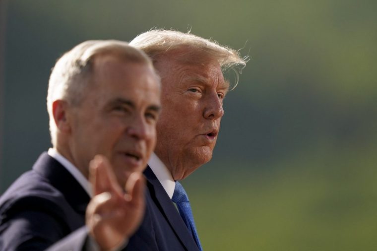 Canadian Prime Minister Mark Carney (L) and US President Donald Trump arrive for a family photo during the Group of Seven (G7) Summit at the Kananaskis Country Golf Course in Kananaskis, Alberta, Canada on June 16, 2025. (Photo by Geoff Robins / AFP) (Photo by GEOFF ROBINS/AFP via Getty Images)