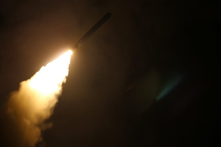 The guided-missile destroyer USS Laboon (DDG 58) fires a Tomahawk land attack missile at a target in Syria from the US 5th Fleet Area of Responsibility, April 14, 2018. Image courtesy Petty Officer 3rd Class Kallysta M Castillo/U.S. Navy. (Photo by Smith Collection/Gado/Getty Images)