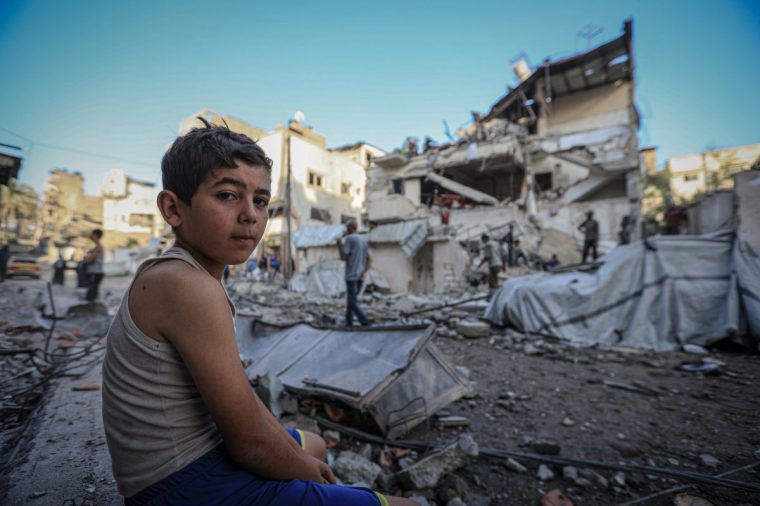 GAZA CITY, GAZA - AUGUST 20: Palestinians arrive at the scene of the attack to inspect the area after an attack carried out by the Israeli army on a house belonging to the Al Masri family in central Gaza City, Gaza on August 20, 2025. A large part of the family's home was destroyed in the attack, and surrounding buildings were also damaged. (Photo by Hamza Z. H. Qraiqea/Anadolu via Getty Images)
