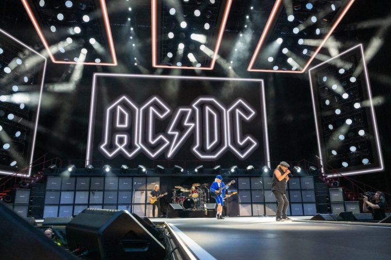 EDINBURGH, SCOTLAND - AUGUST 21: Angus Young and Brian Johnson of AC/DC perform on stage during a concert for the Power Up tour at Murrayfield Stadium on August 21, 2025 in Edinburgh, Scotland. (Photo by Roberto Ricciuti/Getty Images)