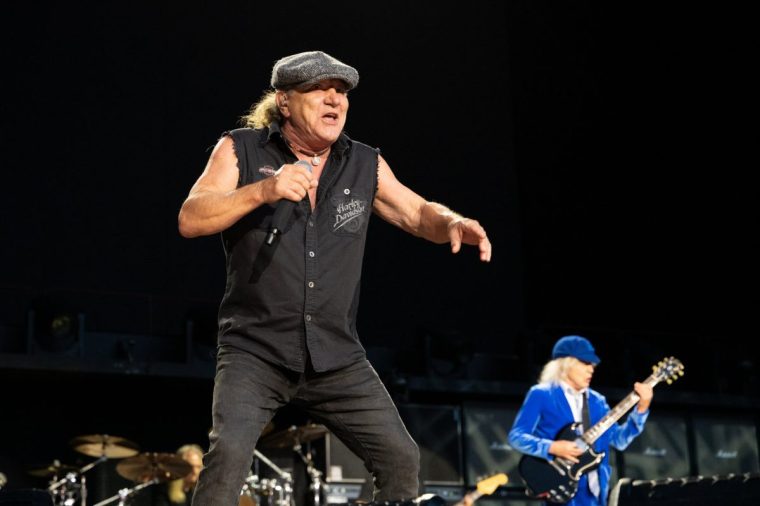 EDINBURGH, SCOTLAND - AUGUST 21: Brian Johnson and Angus Young of AC/DC perform on stage during a concert for the Power Up tour at Murrayfield Stadium on August 21, 2025 in Edinburgh, Scotland. (Photo by Roberto Ricciuti/Getty Images)