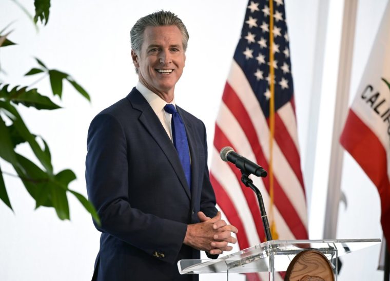 SAN FRANCISCO, CALIFORNIA - AUG 22: Governor Gavin Newsom speaks at Salesforce Tower on August 22, 2025 in San Francisco, California during a signing ceremony for a Memorandum of Understanding (MOU) between California and Denmark supporting cooperation on green economy resilience, technology, and innovation. Home to Silicon Valley and the world's fourth largest economy, California is uniquely positioned to lead the international conversation and help guide the world in the responsible implementation and use of emerging technology. The Governor and California's delegation met with Denmark's delegation led by Minister for Foreign Affairs Lars Lokke Rasmussen and Ambassador of Denmark to the U.S. Jesper Moller Sorensen. (Photo by Tayfun Coskun/Anadolu via Getty Images)