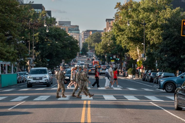 WASHINGTON, DC - AUGUST 23: National Guard soldiers patrol the the 14th street entertainment and restaurant area on August 23, 2025 in Washington, DC. U.S. President Donald Trump announced plans to deploy federal officers and the National Guard to the District in order to place the DC Metropolitan Police Department under federal control and assist in crime prevention in the nation's capital. (Photo by Andrew Leyden/Getty Images)