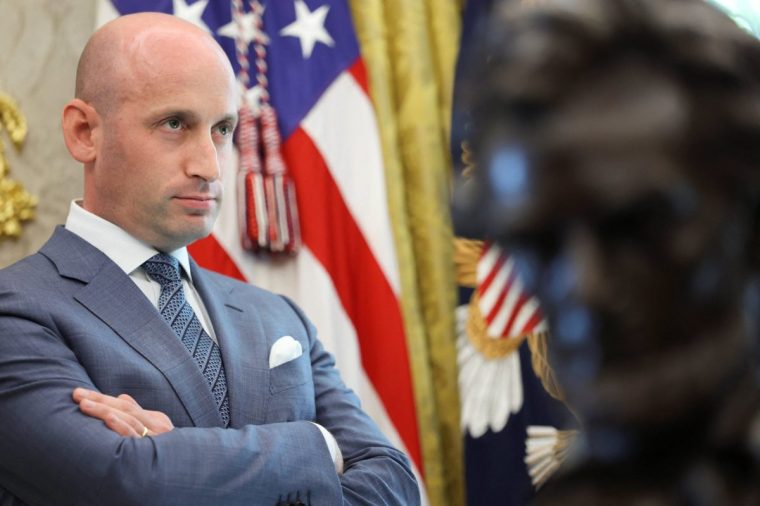 White House Deputy Chief of Staff Stephen Miller looks on during the signing of executive orders by U.S. President Donald Trump in the Oval Office at the White House in Washington, D.C., U.S., August 25, 2025. REUTERS/Jonathan Ernst