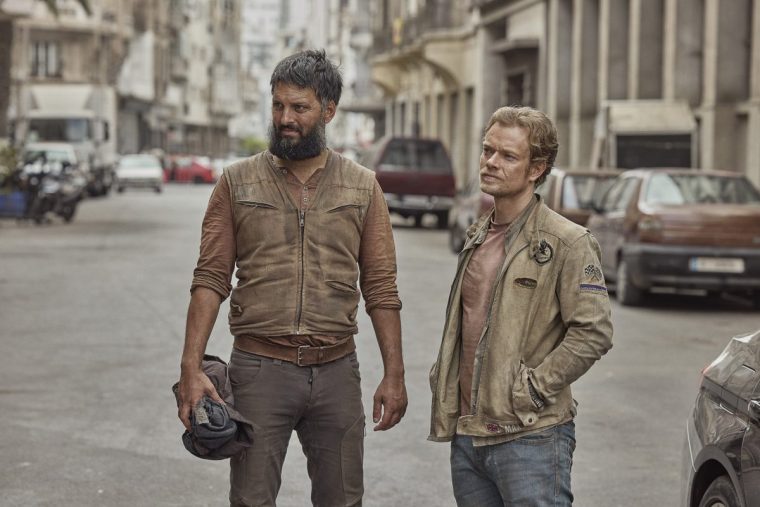 When the path of free-spirited drug smuggler Max (Alfie Allen) collides with JJ (Shazad Latif), an enigmatic outsider on the run, an unlikely friendship is formed. They???re swept into a chaotic, high-stakes mission they never signed up for??? trafficking highly enriched uranium across North Africa and the Middle East, with the CIA, MI6, and a global web of opposing forces closing in fast. Leading the charge for the CIA is highly skilled scientist and a Non-Official Cover (NOC) officer Cassie Elliott (Samira Wiley). Convinced Max and JJ are in league with violent extremists, her relentless pursuit puts them all on a collision course revealing that nothing is what it seems, and everyone has an ulterior motive. The pair find themselves on a wild road trip , confronting covert operatives, an internationally funded cartel, and ultimately their own pasts. What starts as a bid for survival slowly becomes something more: a reluctant partnership, a shot at redemption, and one hell of a ride.