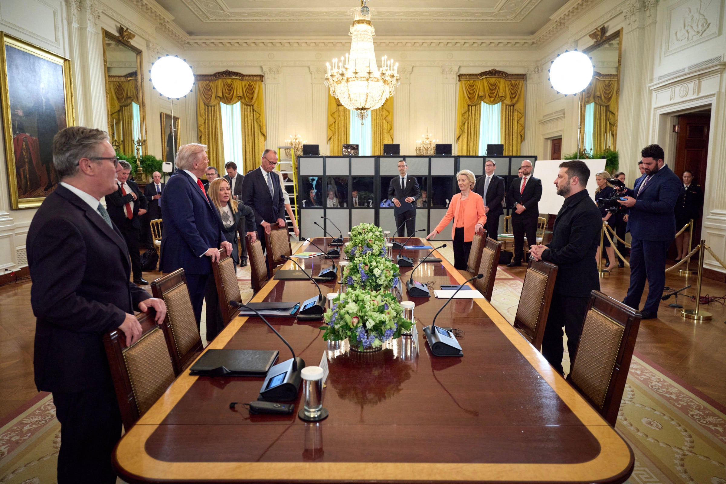 Ukrainian president Volodymyr Zelensky gathers with British prime minister Keir Starmer, US president Donald Trump, Italian prime minister Giorgia Meloni, German chancellor Friedrich Merz, and European Commission president Ursula von der Leyen in the East Room of the White House in Washington, DC