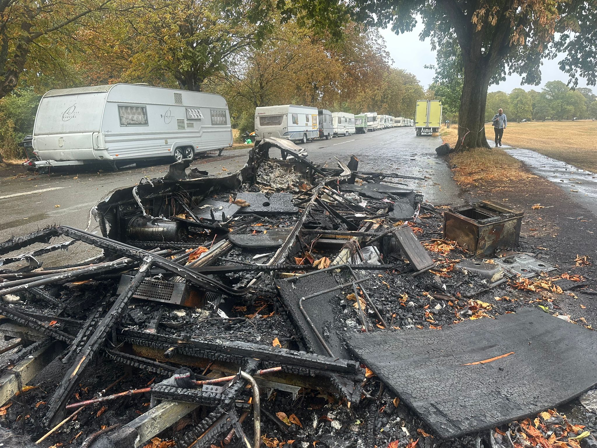 A caravan was set alight almost two weeks ago. Wreckage of the fire remains, but council bosses say it will now be removed in the coming days