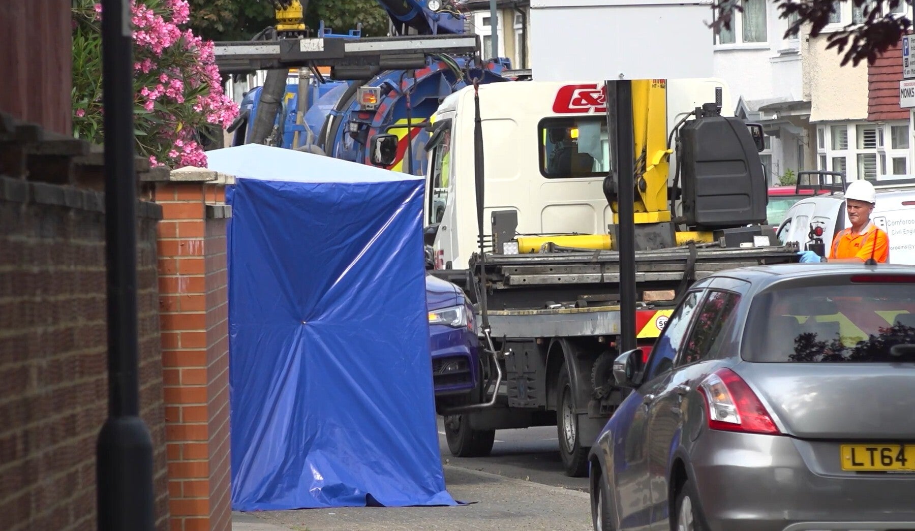 A 26-year-old man was arrested on suspicion of murder, while a 31-year-old woman was also arrested at the scene for conspiracy to murder