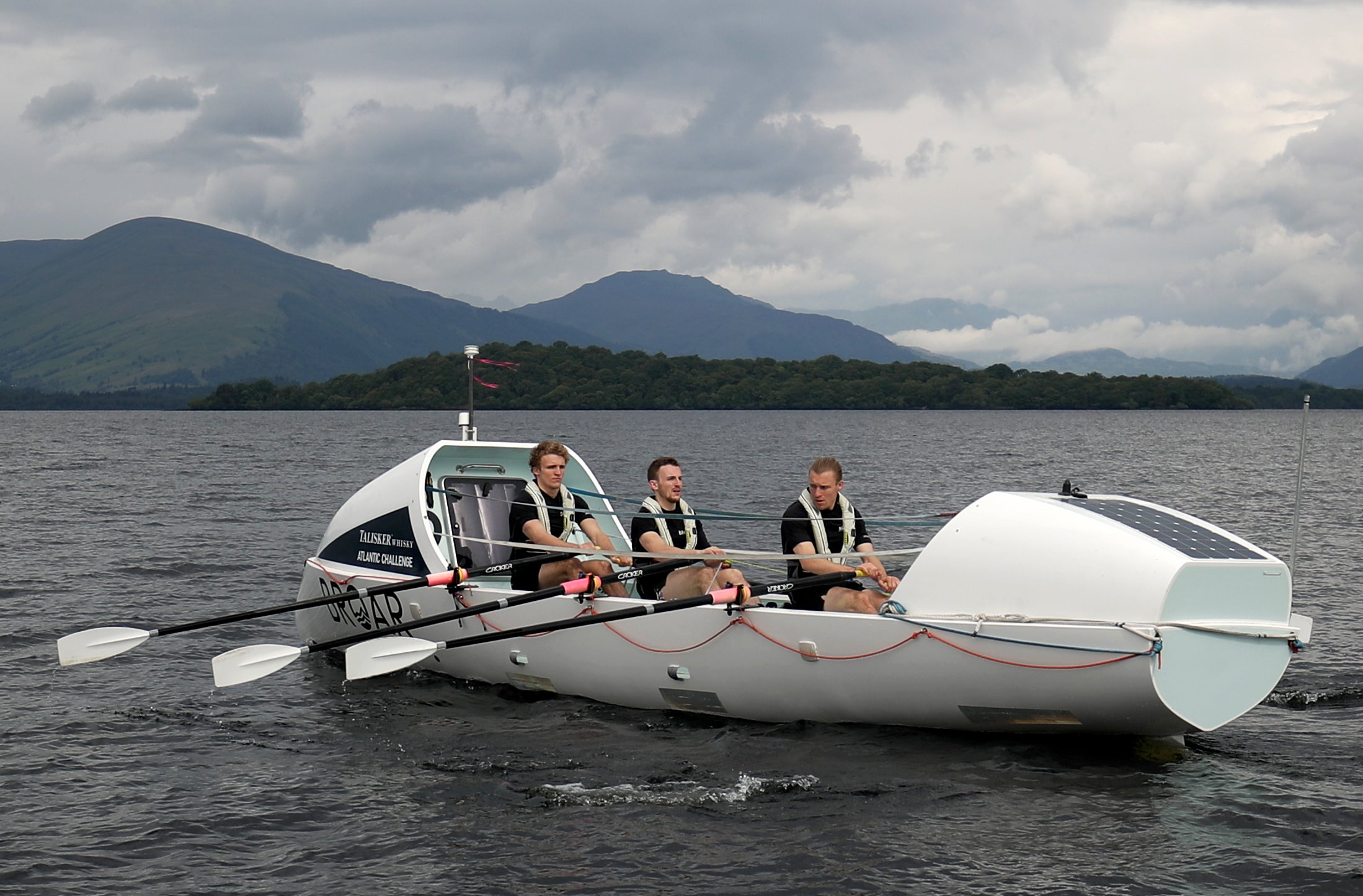 Lachlan, Ewan, and Jamie MacLean, from Edinburgh, who have broken the record for their Pacific row
