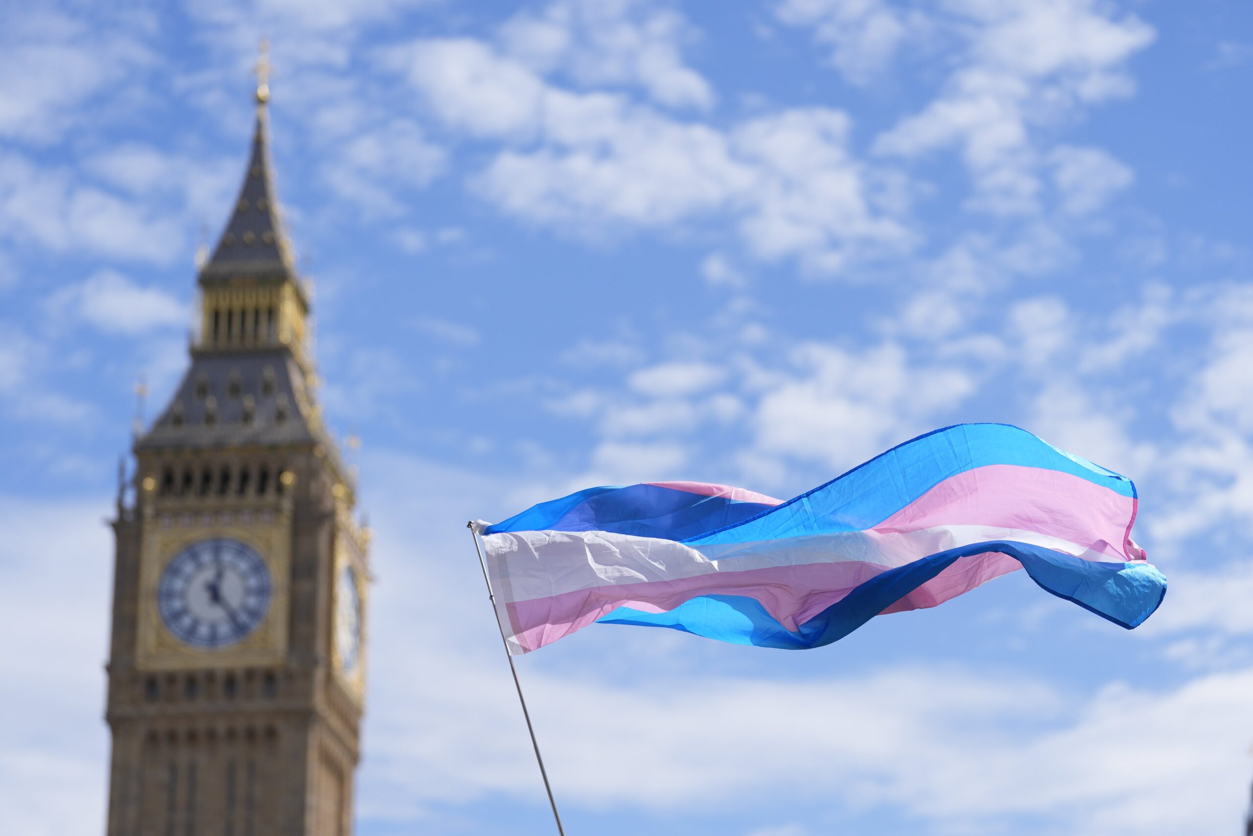 A flag in the colours of the trans movement flies in central London (Andrew Matthews/PA)