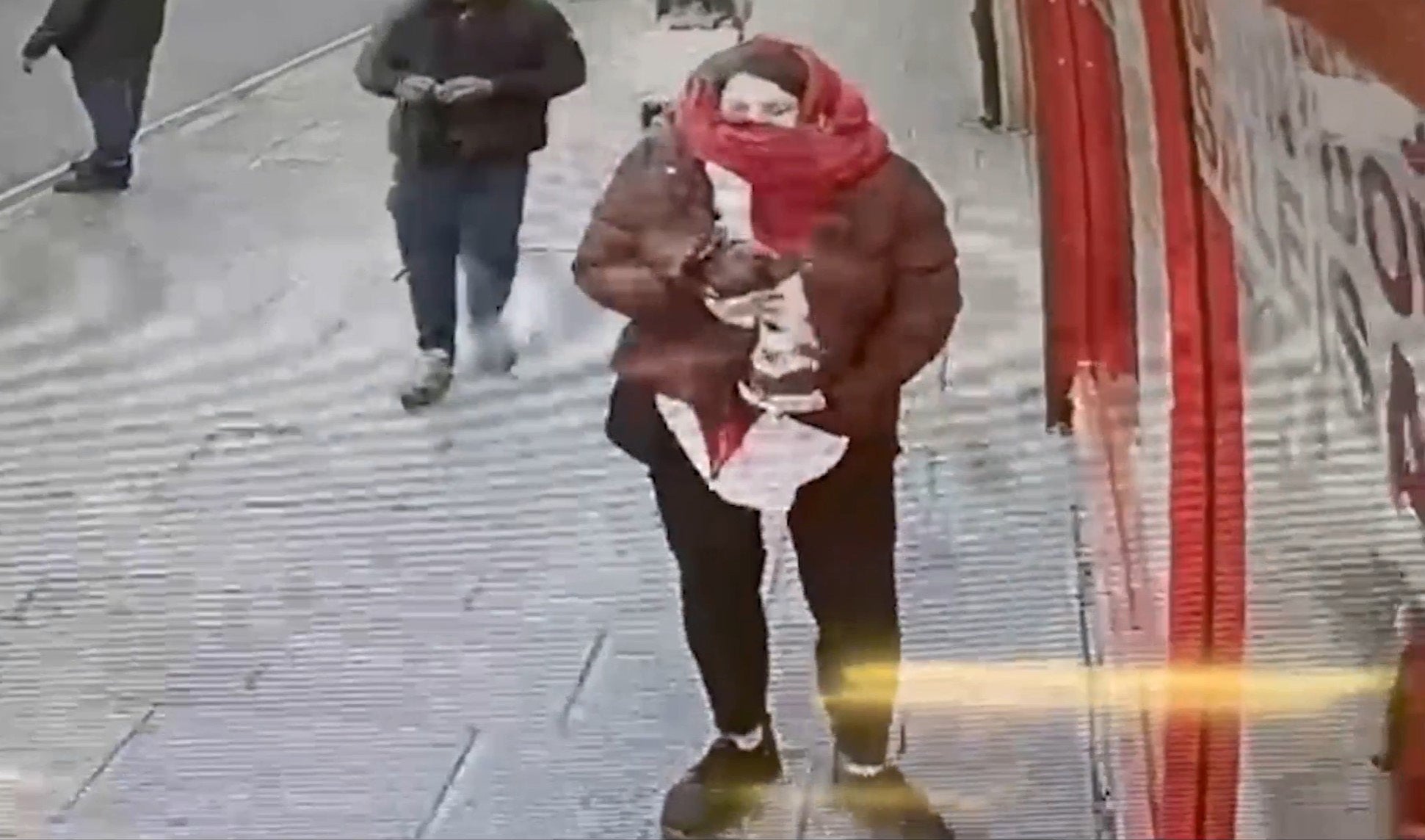 CCTV footage of Constance Marten holding baby Victoria under her coat in east London