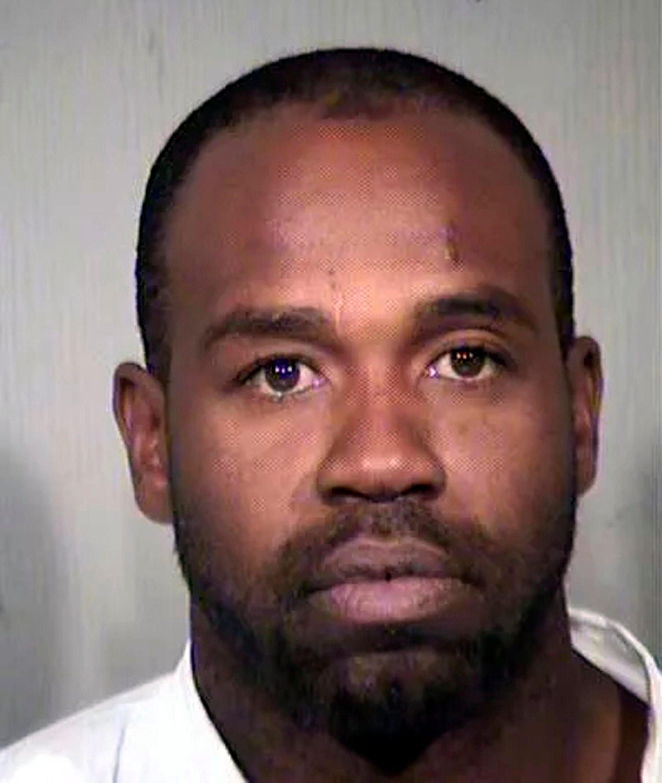 This undated file booking photo provided by the Maricopa County Sheriff's Office shows Cleophus Cooksey Jr. (Maricopa County Sheriff's Office via AP, File)