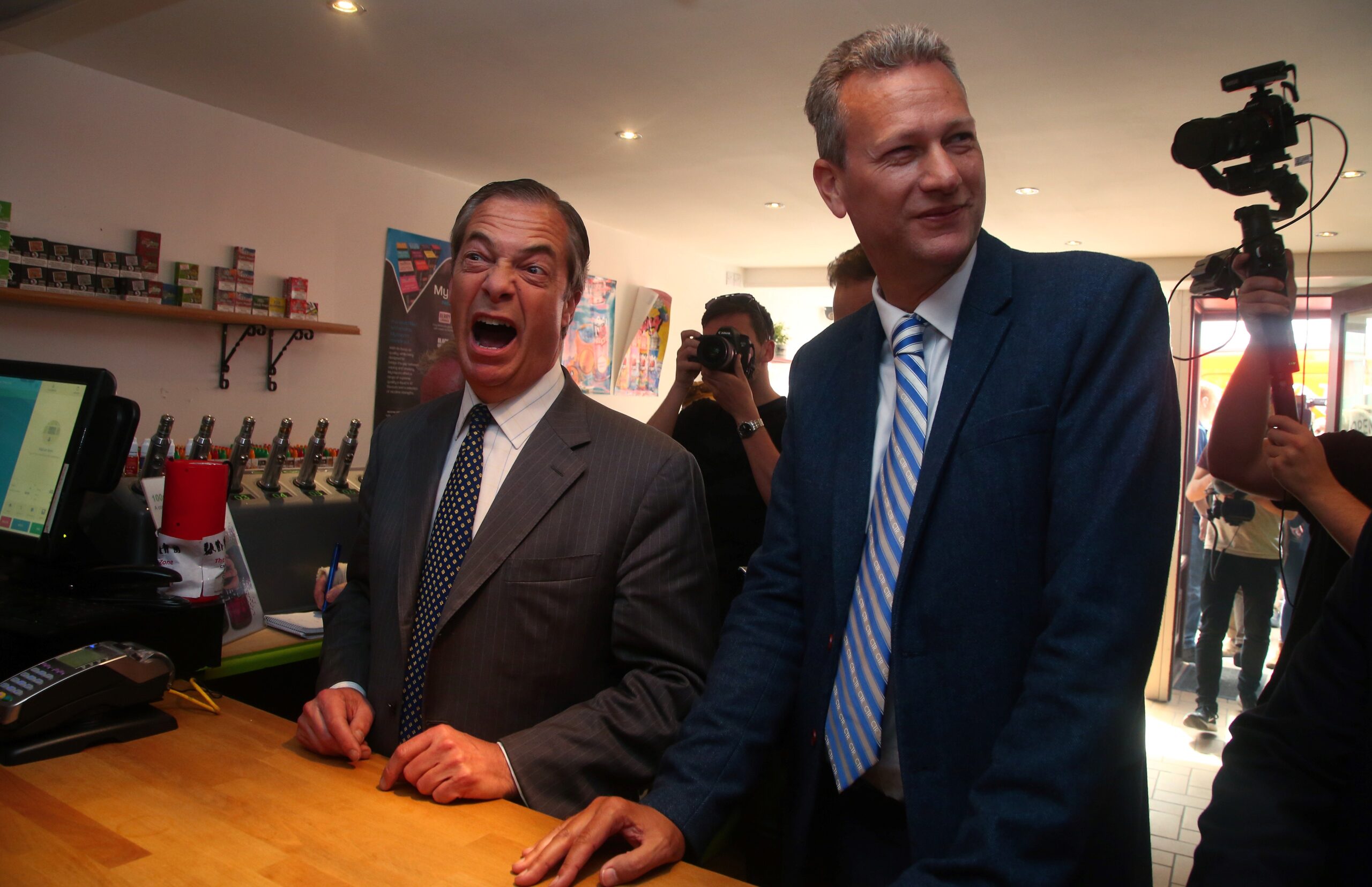 Nathan Gill, then a Brexit Party MEP candidate for Wales, and then-Brexit Party leader Nigel Farage, pictured in 2019