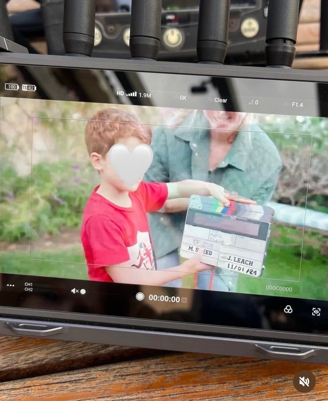 The couple's eldest son Archie can be seen holding the clapperboards between takes