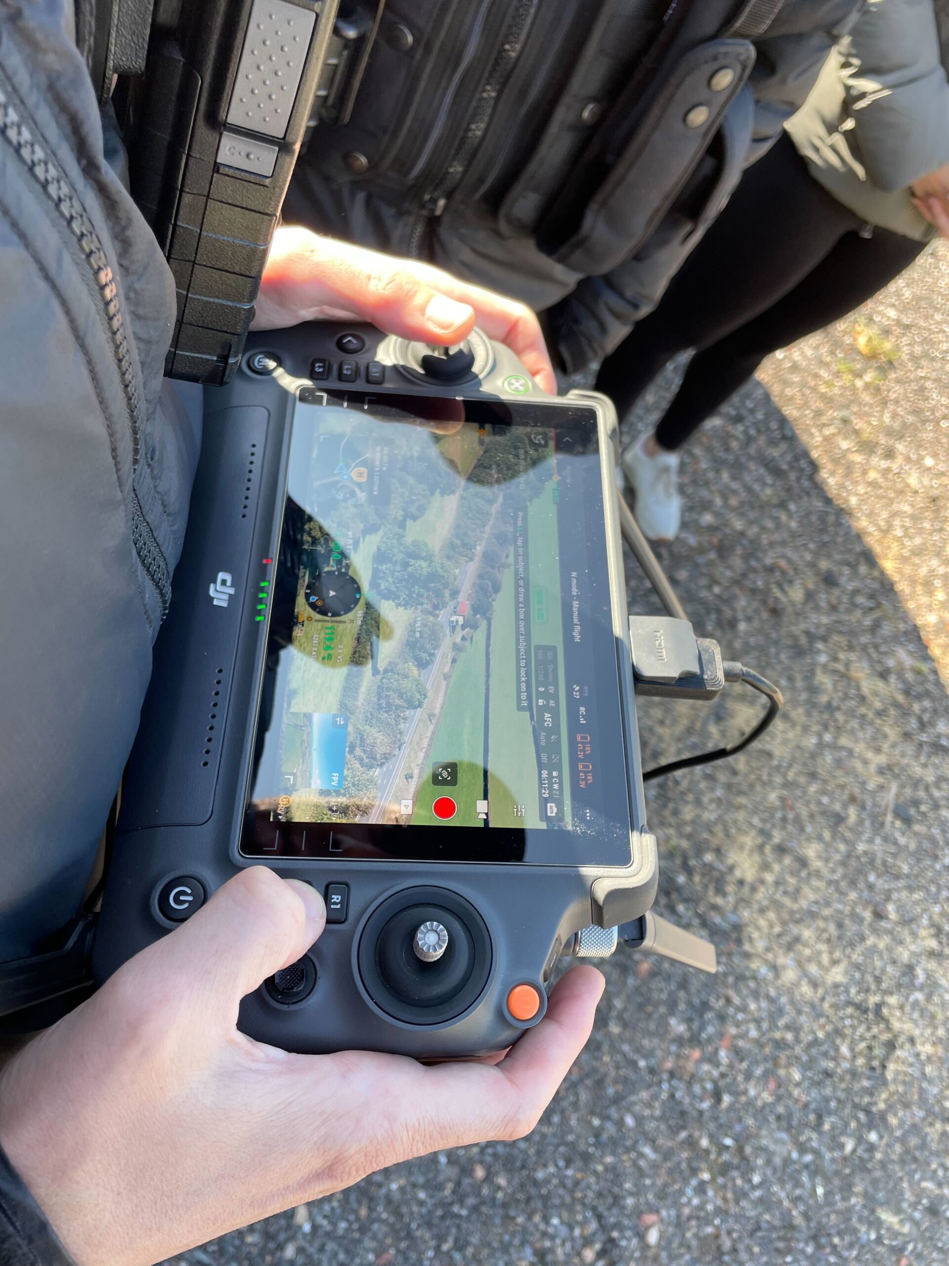 The drone is piloted with a large remote control pad