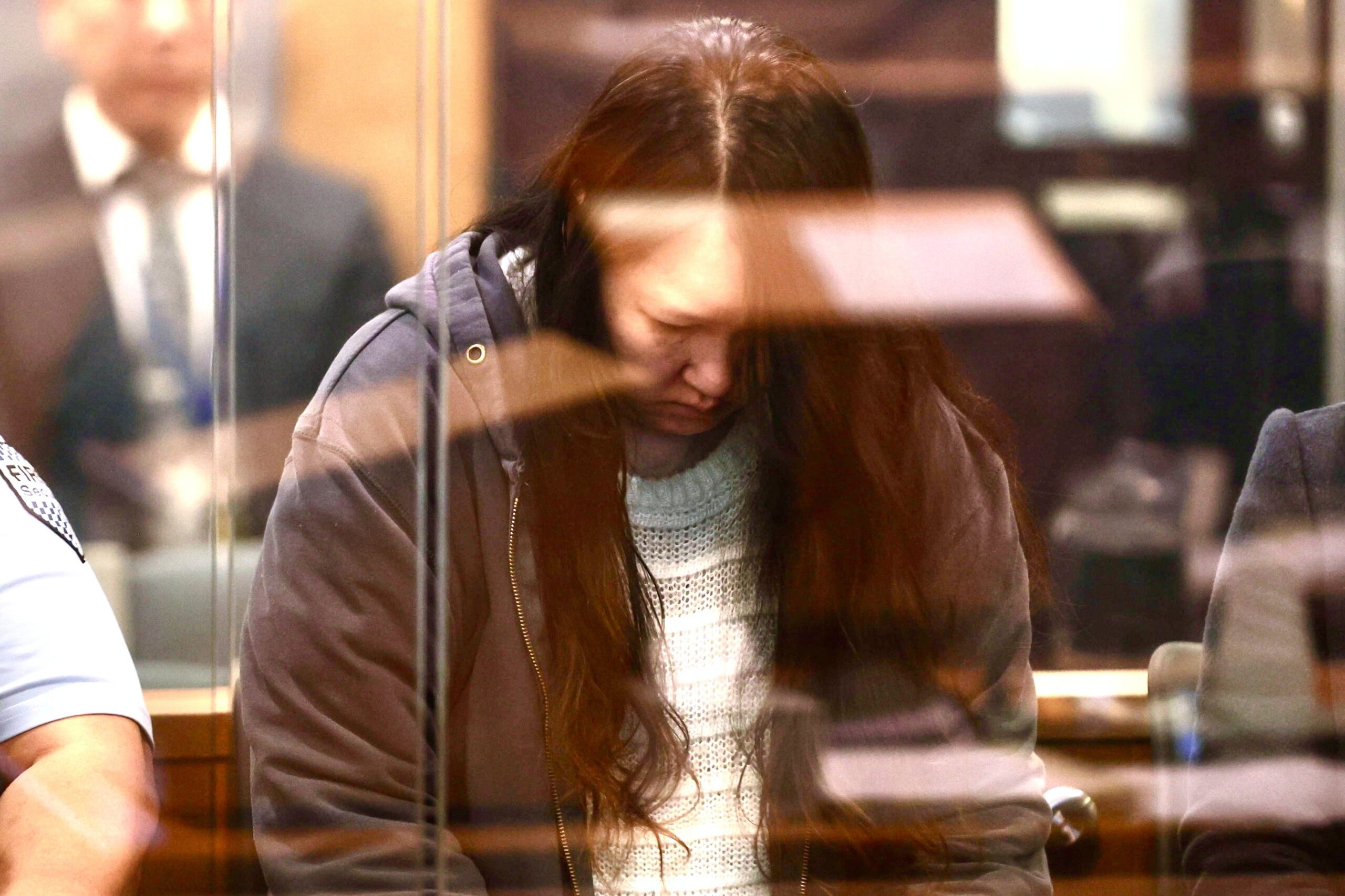 Hakyung Lee stands in the dock at the High Court in Auckland, New Zealand, on 8 September 2025