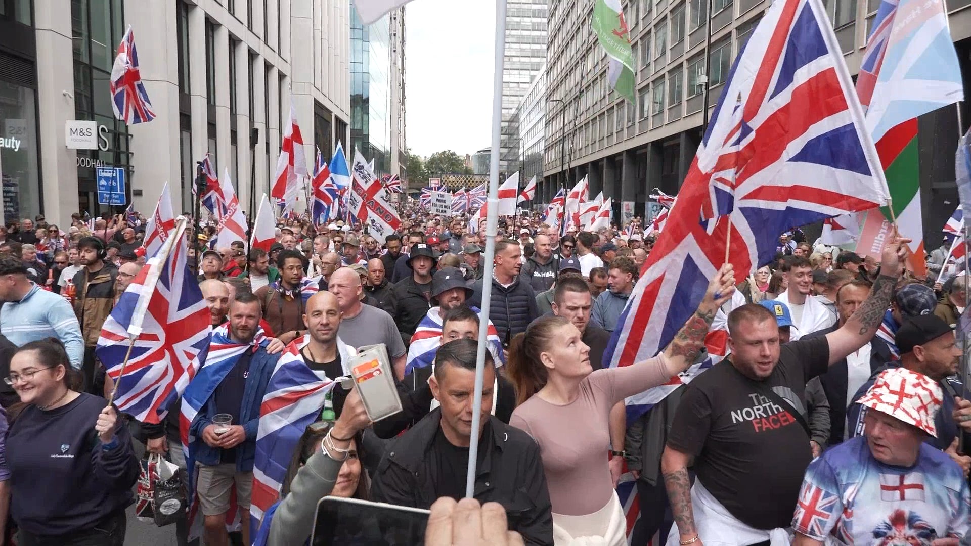 People taking part in a Robinson-led ‘Unite the Kingdom’ rally in central London on Saturday