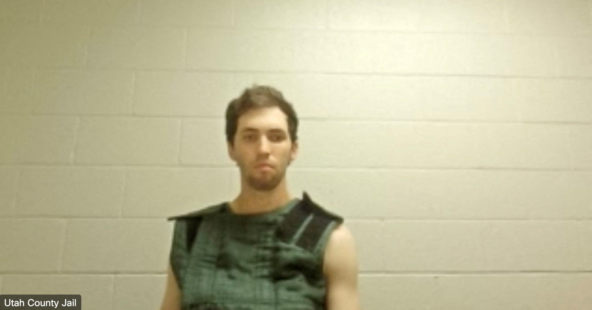 In this image from video provided by Utah State Courts, Tyler James Robinson attends a virtual court hearing from prison in Utah to hear the charges for the alleged murder of Charlie Kirk.