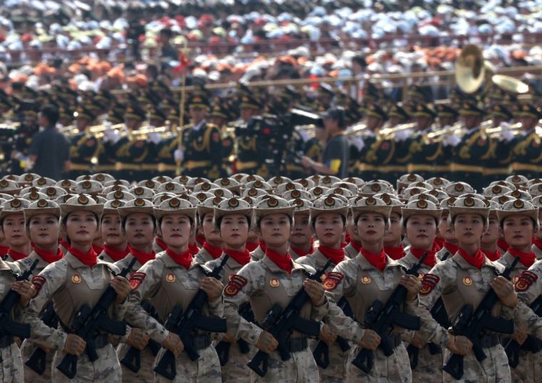 Chinese militia members march during a military parade to mark the 80th anniversary of the end of World War Two, in Beijing, China, September 3, 2025. REUTERS/Maxim Shemetov TPX IMAGES OF THE DAY