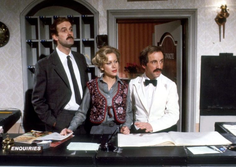 Picture shows: Basil Fawlty (JOHN CLEESE), Polly (CONNIE BOOTH) and Manuel (ANDREW SACHS) WARNING This image may only be used for publicity purposes in connection with the broadcast of the programme as licensed by BBC Worldwide Ltd & must carry the shown copyright legend. It may not be used for any commercial purpose without a licence from the BBC. ?? BBC 1979 Fawlty Towers Series 2, Episode 6 Basil the Rat TV still Image from UKTV