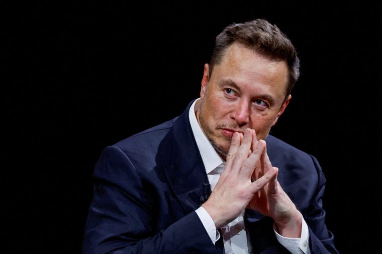 FILE PHOTO: Elon Musk, Chief Executive Officer of SpaceX and Tesla, gestures as he attends the Viva Technology conference dedicated to innovation and startups at the Porte de Versailles exhibition centre in Paris, France, June 16, 2023. REUTERS/Gonzalo Fuentes/File Photo