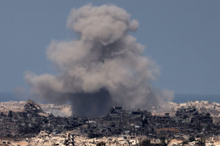 This picture taken from a position at Israel's border with the Gaza Strip shows smoke billowing amid Israeli bombardment of the besieged Palestinian territory on September 16, 2025. Israel unleashed a massive new bombing campaign on Gaza City on September 16 after visiting US Secretary of State Marco Rubio backed the ally's goal of eradicating the Palestinian Hamas movement and warned that only days may be left for a diplomatic solution. (Photo by Menahem KAHANA / AFP) (Photo by MENAHEM KAHANA/AFP via Getty Images)