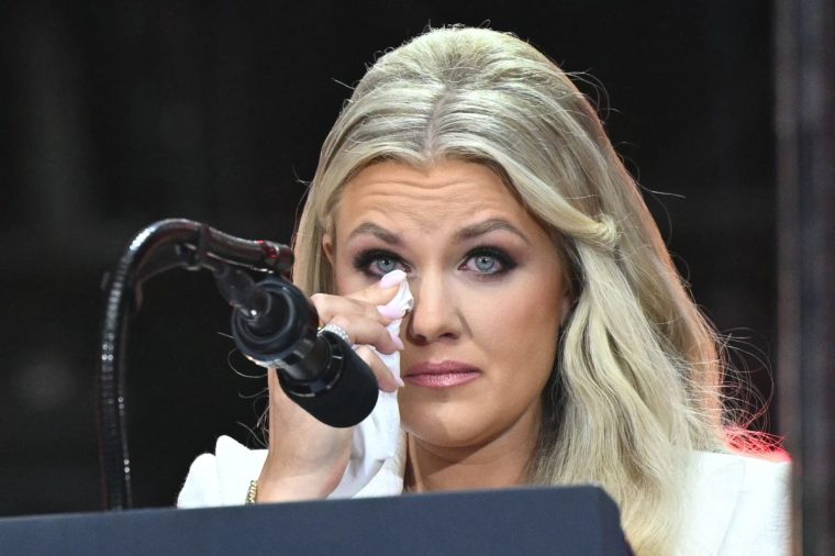 Erika Kirk, Charlie Kirk's widow, wipes away tears as she speaks at the public memorial service for right-wing activist Charlie Kirk at State Farm Stadium in Glendale, Arizona, on September 21, 2025. (Photo by Mandel NGAN / AFP) (Photo by MANDEL NGAN/AFP via Getty Images)