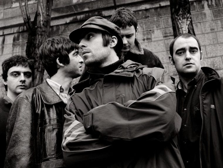A tense photo-shoot with Oasis in Paris in November 1995 resulted in this band shot taken on the banks of The Seine that reflects the mood (Photo: Jill Furmanovsky)