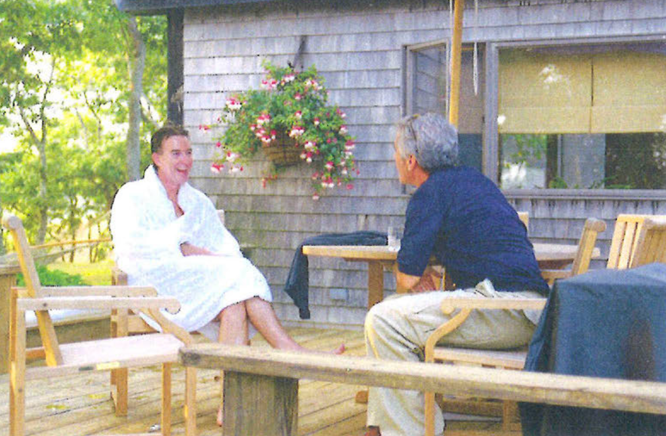 Peter Mandelson (left) speaks with Jeffrey Epstein. Mandelson appears to have called Epstein as his 'best pal' in a birthday note