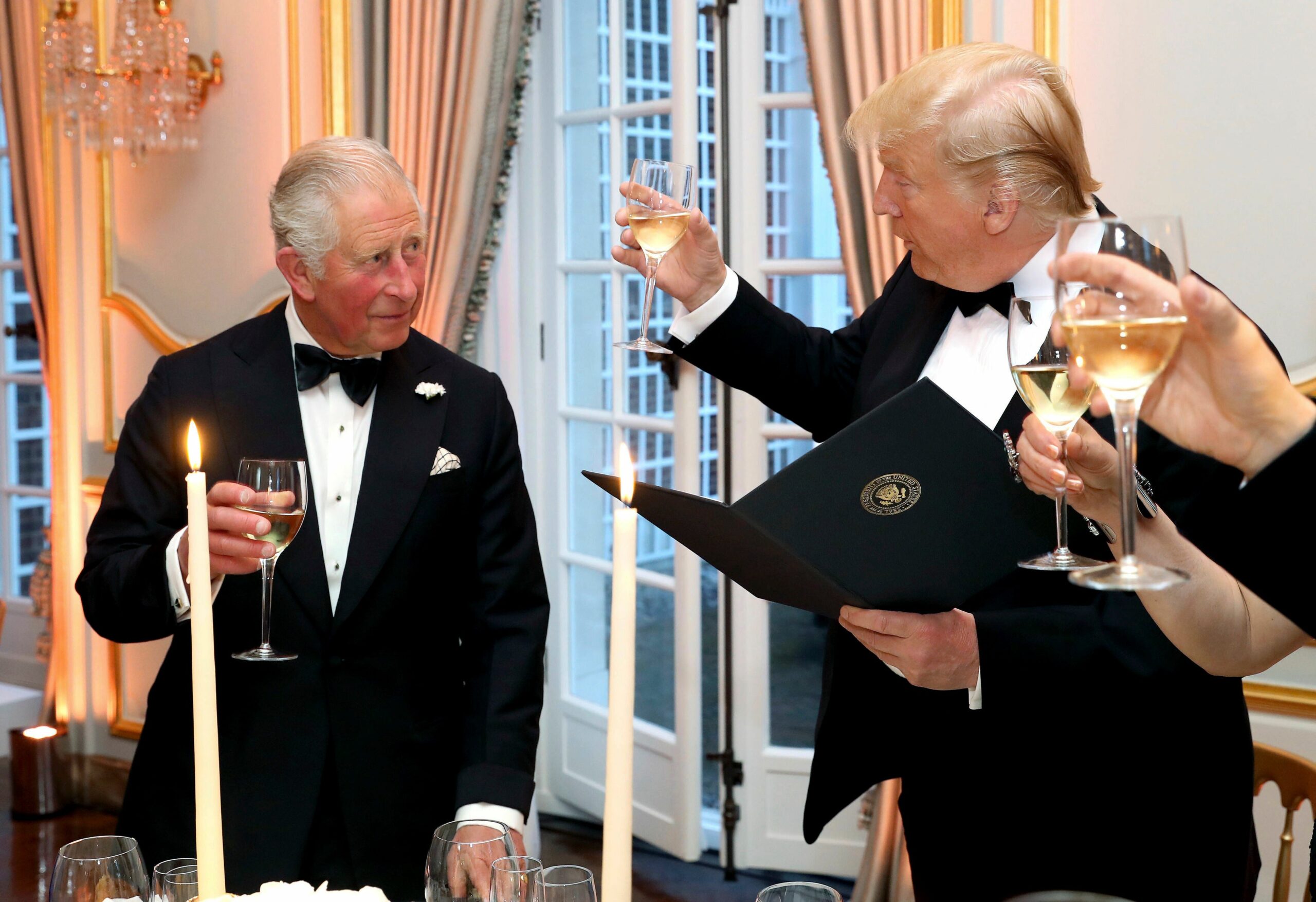 Trump and then-Prince Charles raise a toast in London in 2019