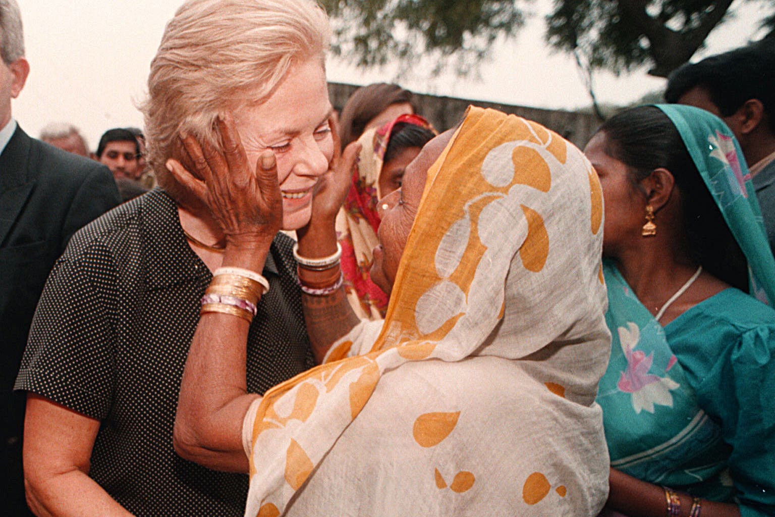The Duchess of Kent being greeted in a slum area of Varanasi in northern India during her visit to mark the 50th anniversary of Unicef in 1996