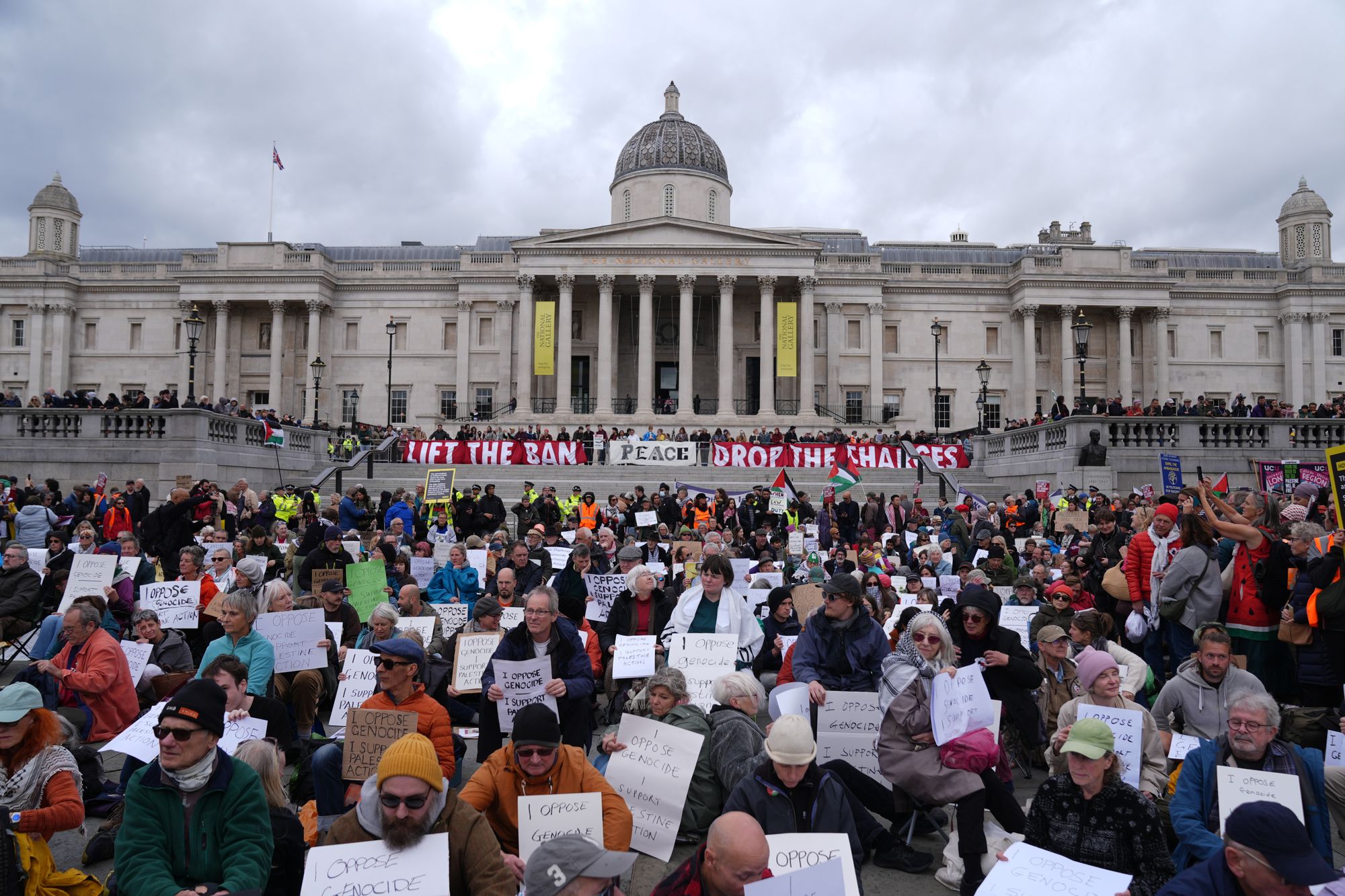 Protesters taking part in a demonstration in support of Palestine Action in Trafalgar Square