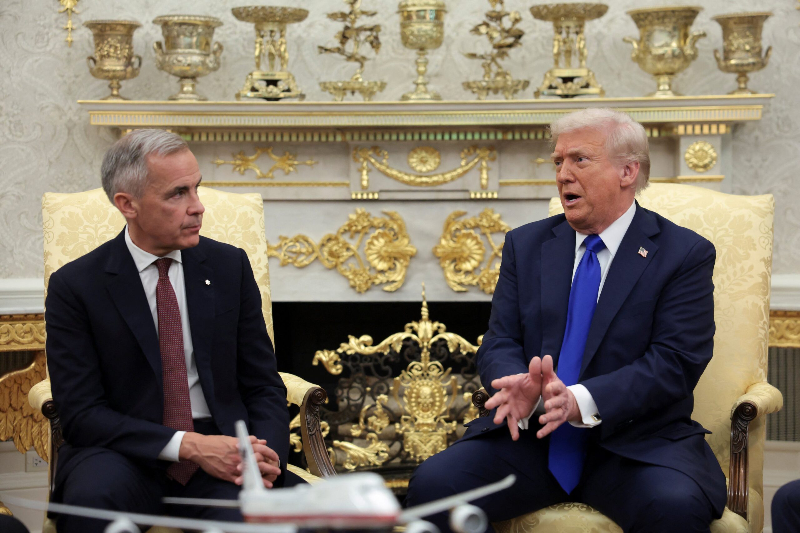 President Donald Trump and Canada's Prime Minister Mark Carney meet in the Oval Office at the White House in Washington, D.C., U.S., October 7, 2025. REUTERS/Evelyn Hockstein