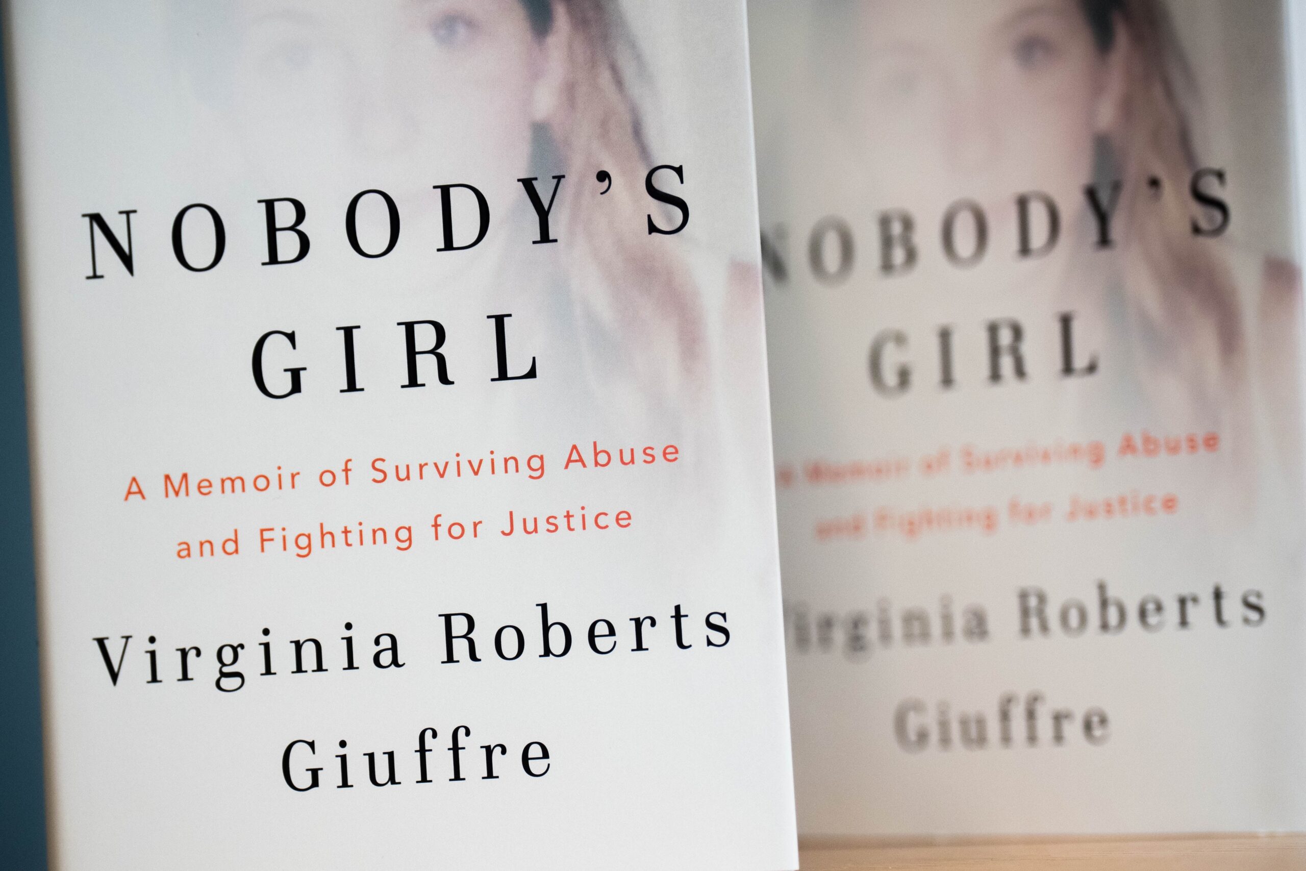Copies of Nobody’s Girl by Virginia Roberts Giuffre, co-written by Amy Wallace (James Manning/PA)