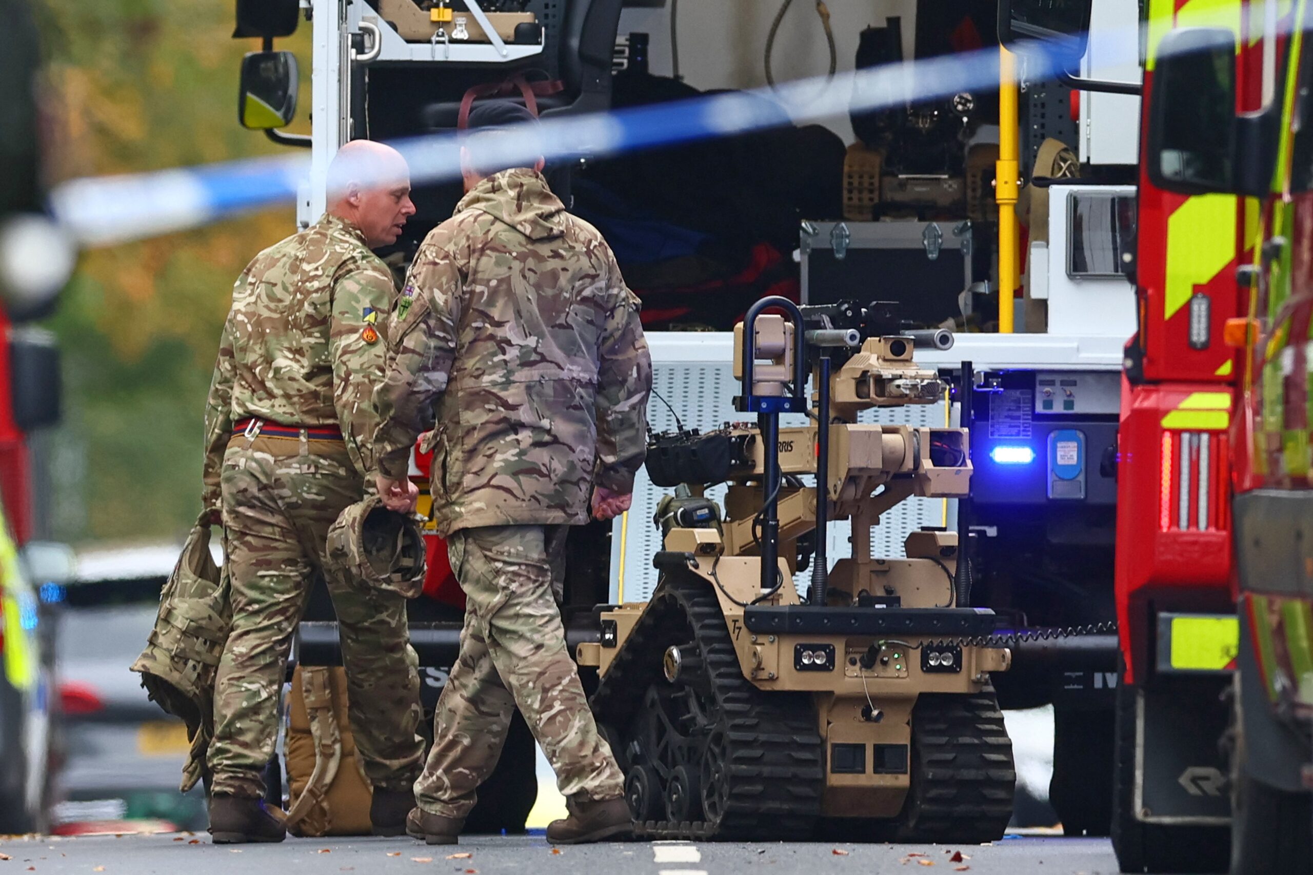 Bomb disposal experts were called to the scene after the knifeman was wearing what appeared to be an explosive