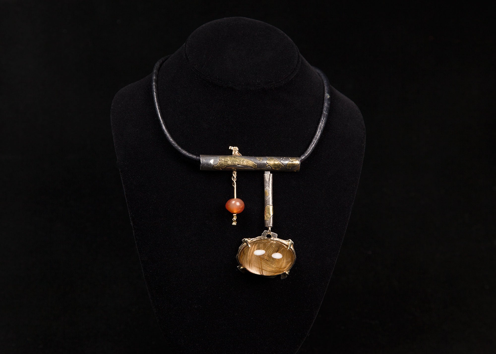 The Rutilated Quartz Dome Neckpiece by Florence Resnikoff which was taken from the Oakland Museum of California