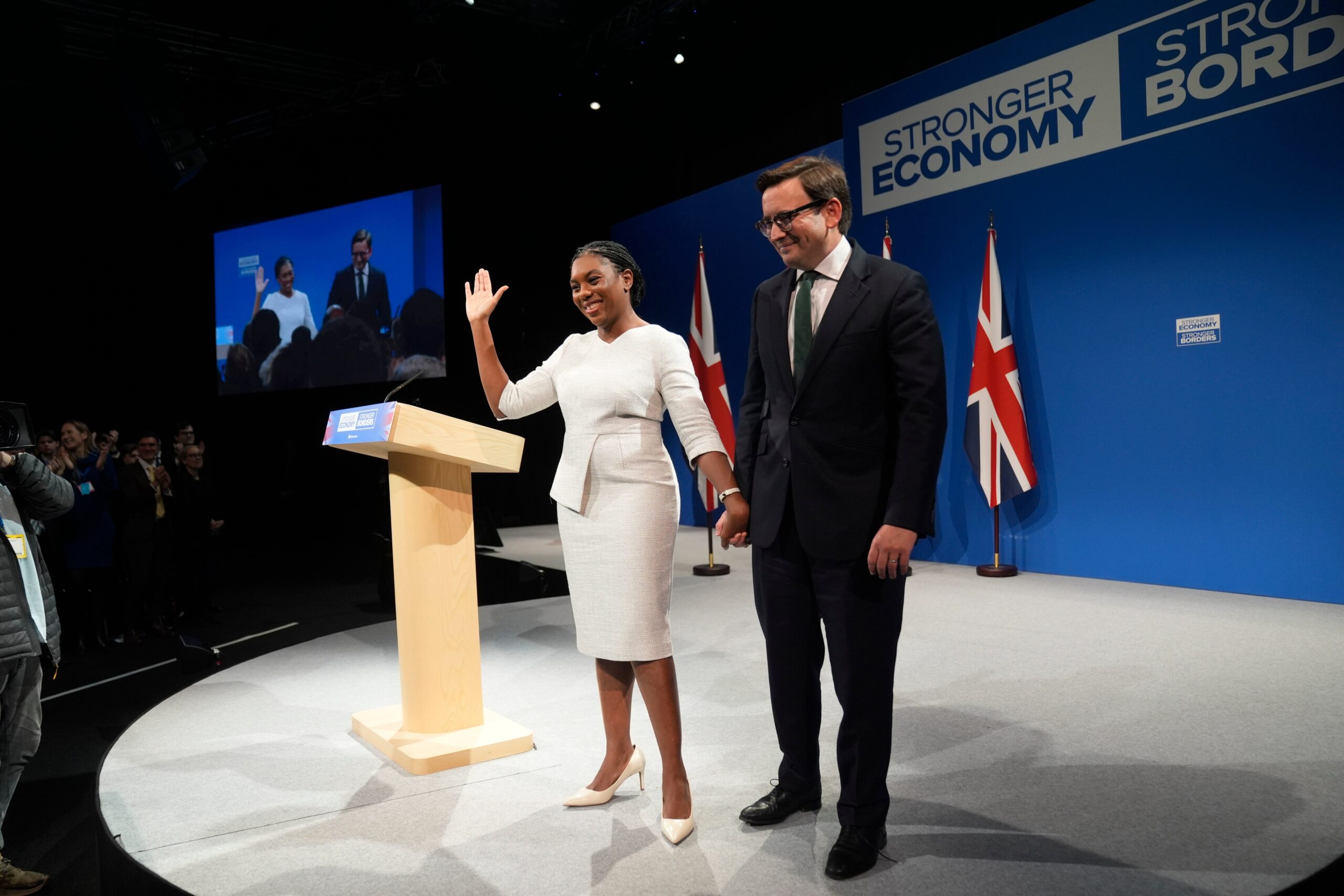 Kemi Badenoch with her husband, Hamish Badenoch, after her speech